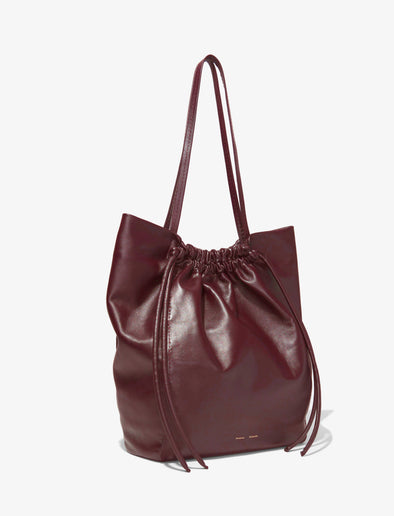 Side image of Drawstring Tote in DARK RED