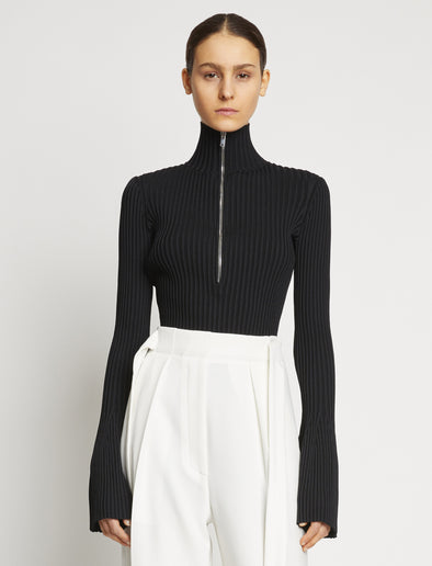 Proenza Schouler front cropped image of model wearing Viscose Rib Zip Sweater in black