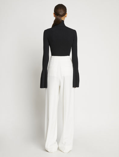 Proenza Schouler back image of model wearing Viscose Rib Zip Sweater in black