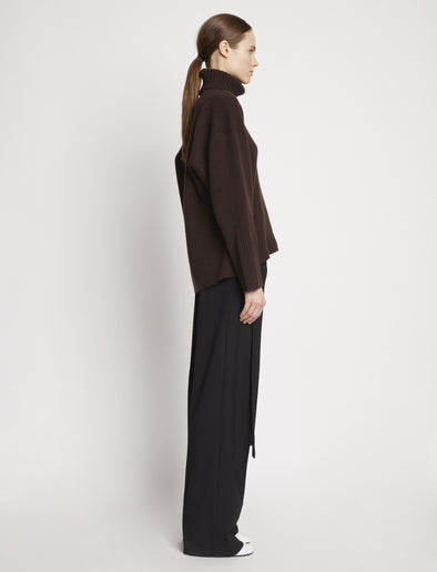 Side full length image of model wearing Doubleface Cashmere Oversized Turtleneck in BROWN