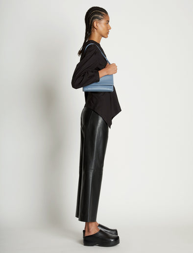 Image of model wearing Small Accordion Flap Bag in DOVE GREY