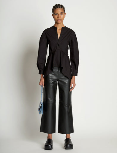 Image of model wearing Small Accordion Flap Bag in DOVE GREY