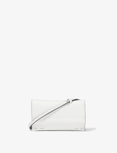 Front image of Small Accordion Flap Bag in OPTIC WHITE with strap down