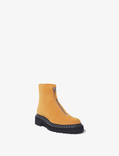 Front 3/4 image of Lug Sole Zip Boots in Light/Pastel Brown