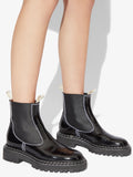 Image of model wearing Lug Sole Chelsea Boots in Black