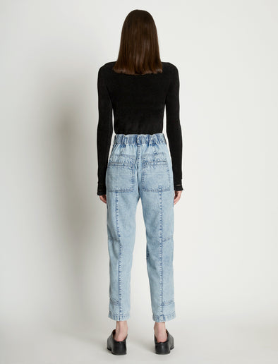 Back full length image of model wearing Chambray Pocket Pants in LIGHT INDIGO