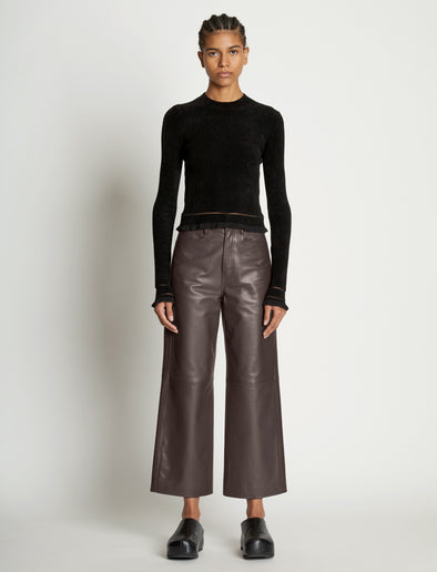 Front full length image of model wearing Cropped Turtleneck Chenille Sweater in BLACK