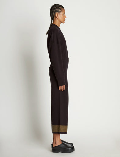 Side full length image of model wearing Cashmere Blend Sweatpants in BLACK/DARK SAND
