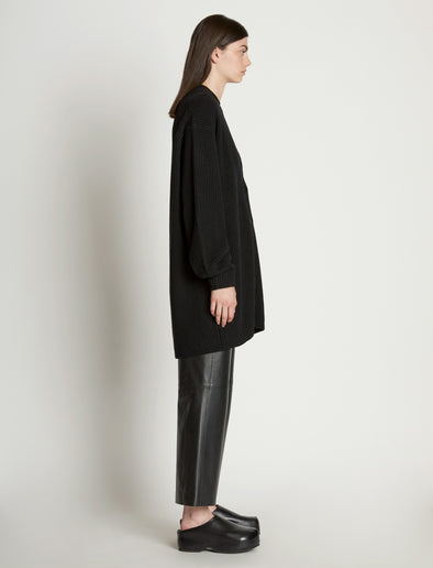 Side full length image of model wearing Cashfeel Cardigan in BLACK