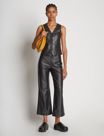 Front full length image of model wearing Leather Vest in BLACK