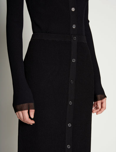 Detail image of model wearing Rib Knit Button Front Skirt in BLACK