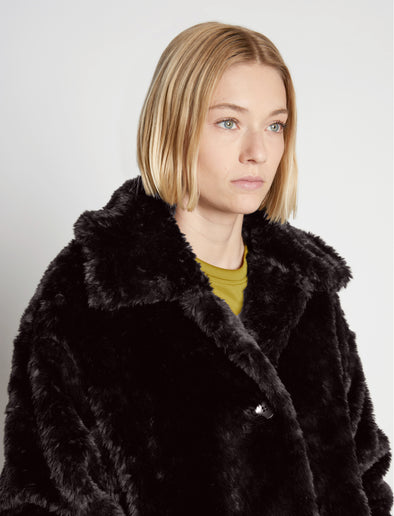 Detail image of model wearing Faux Rabbit Peacoat in BLACK