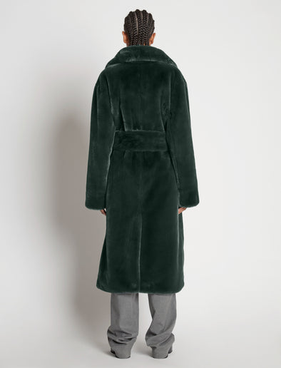 Back full length image of model wearing Faux Fur Belted Coat in PINE