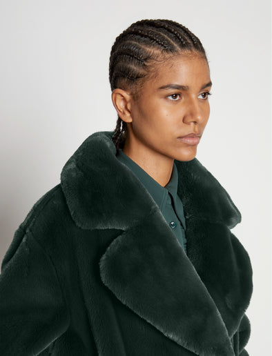 Detail image of model wearing Faux Fur Belted Coat in PINE