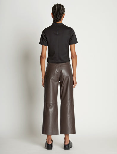 Back full length image of model wearing Scuba Short Sleeve Shirt in BLACK