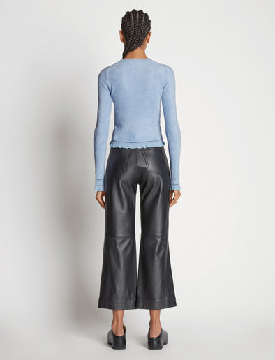 Back full length image of model wearing Cropped Turtleneck Chenille Sweater
in PERIWINKLE