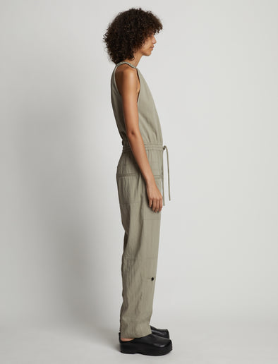 Side full length image of model wearing Drapey Suiting Tank Jumpsuit in GREY