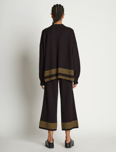 Back full length image of model wearing Cashmere Blend Sweatshirt in BLACK/DARK SAND