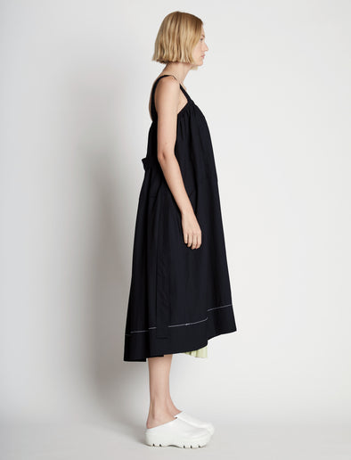 Side full length image of model wearing Drapey Suiting Belted Dress in BLACK