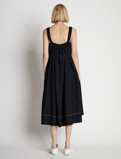 Detail image of model wearing Drapey Suiting Belted Dress in BLACK
