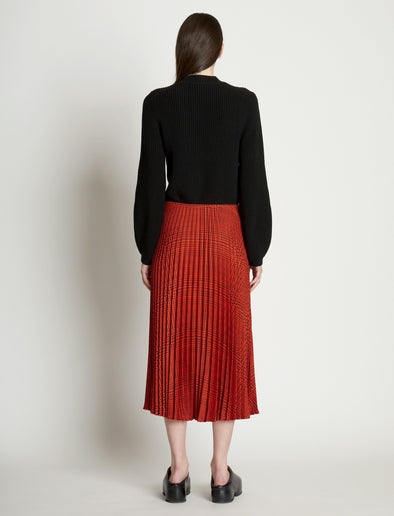 Back full length image of model wearing Pleatable Crepe Midi Skirt
in VERMILLION/BLACK