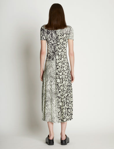 Back full length image of model wearing Mixed Floral Short Sleeve Jersey Dress in PEARL/BLACK