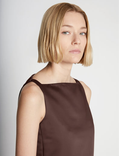 Detail image of model wearing Sleeveless Satin Dress in MOCHA