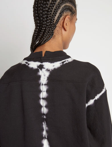 Detail image of model wearing Tie Dye Sweatshirt in BLACK/OFF WHITE