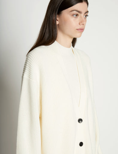 Detail image of model wearing Cashfeel Cardigan in CREAM
