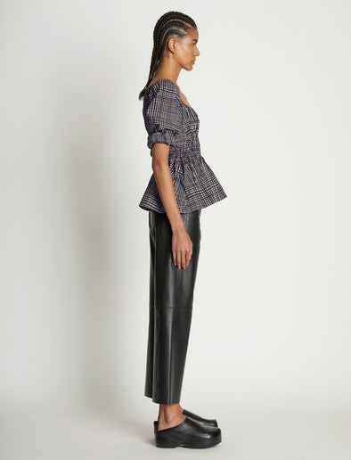 Side full length image of model wearing Grid Poplin Square Neck Top in CREAM/BLACK