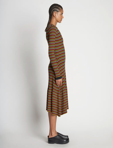 Side full length image of model wearing Stripe Knit Dress in VERMILLION MULTI