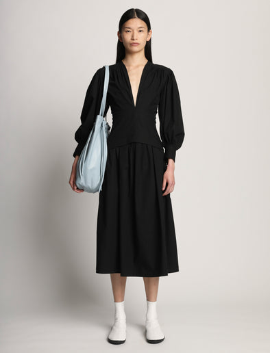 Image of model wearing Drawstring Tote in BLUE STONE