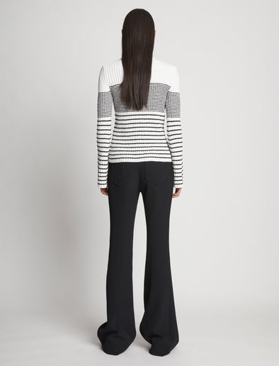 Back full length image of model wearing Boucle Mini Stripe Sweater in OFF WHITE MULTI