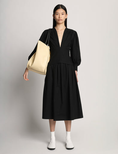 Front image of model wearing XL Ruched Tote in PALE YELLOW