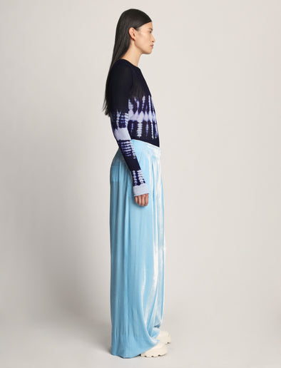 Side full length image of model wearing Viscose Knit Tie Dye Top in BLUE MULTI