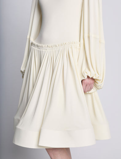 Detail image of model wearing Viscose Crepe Jersey Dress in ECRU