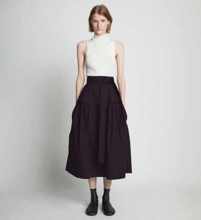 Front full length image of model wearing Poplin Belted Skirt in BLACK