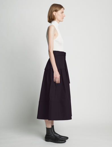 Side full length image of model wearing Poplin Belted Skirt in BLACK