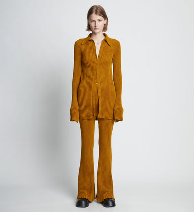 Front full length image of model wearing Velvet Rib Knit Pants in OCHRE