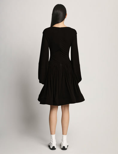 Back full length image of model wearing Viscose Crepe Jersey Dress in BLACK