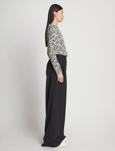 Side full length image of model wearing Printed Floral T-Shirt in BLACK MULTI