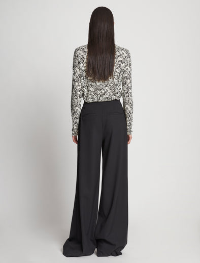 Back full length image of model wearing Printed Floral T-Shirt in BLACK MULTI