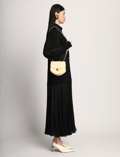 Side image of model carrying Mini Round Dia in BIRCH
