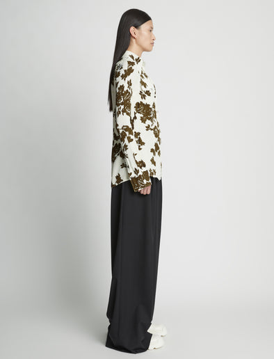 Side full length image of model wearing Floral Garment Printed Shirt in ECRU MULTI