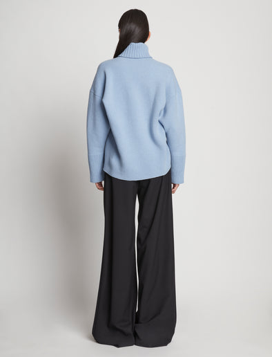 Back image of model wearing Doubleface Cashmere Oversized Turtleneck in light blue