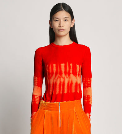 Cropped front image of model wearing Viscose Knit Tie Dye Top in orange multi