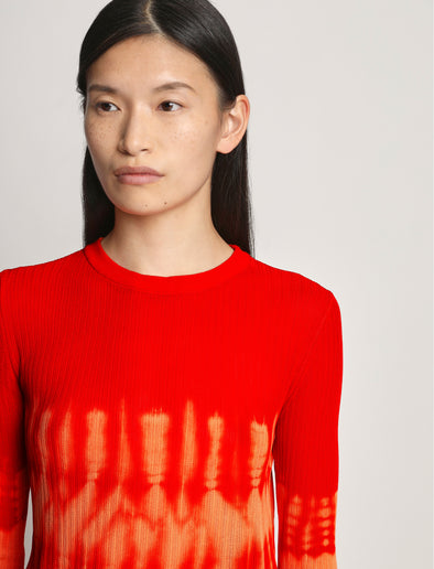 Detail image of model wearing Viscose Knit Tie Dye Top in orange multi