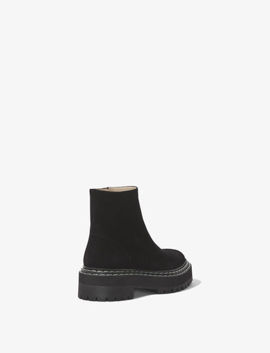 Back 3/4 image of Suede Lug Sole Platform Boots in BLACK