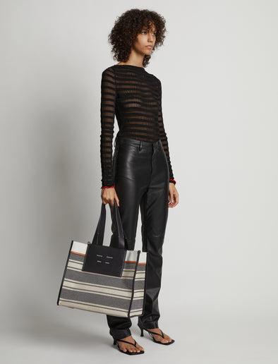 Image of model wearing XL Morris Canvas Tote in ECRU/BLACK