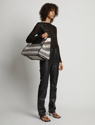 Image of model wearing XL Morris Canvas Tote in ECRU/BLACK